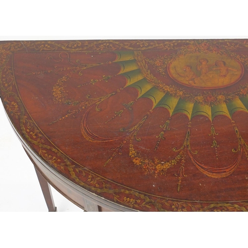 2001 - Sheraton Revival style folding card table decorated with cupids and flowers, raised on square taperi... 