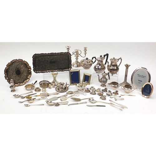 179 - Large selection of silver plated items including teapots, flatware, photo frames, candelabra and tra... 