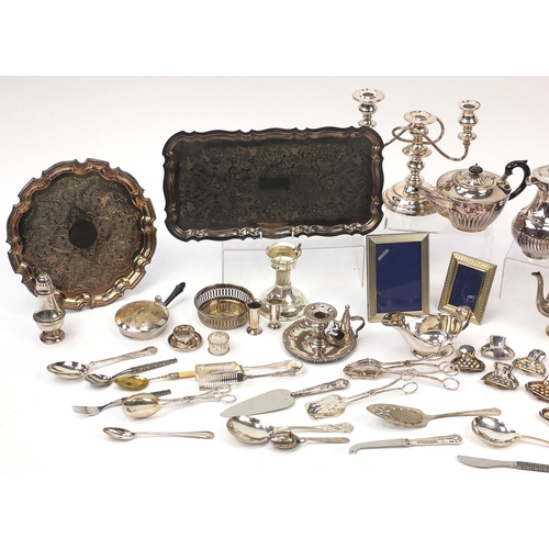 179 - Large selection of silver plated items including teapots, flatware, photo frames, candelabra and tra... 