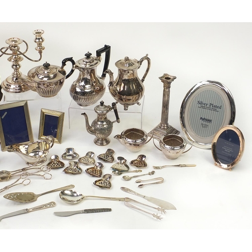 179 - Large selection of silver plated items including teapots, flatware, photo frames, candelabra and tra... 