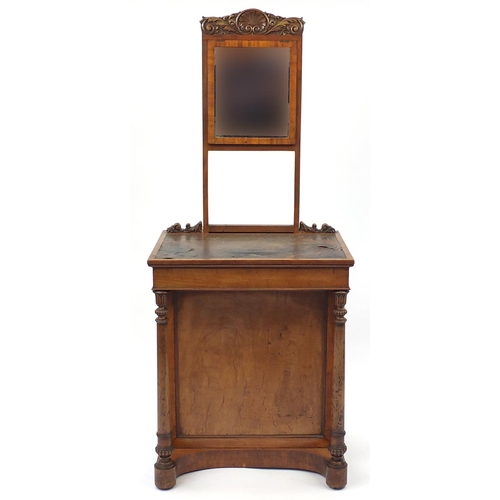 22 - 19th century mahogany Davenport having a rising mirror and fitted side cupboard enclosing four drawe... 