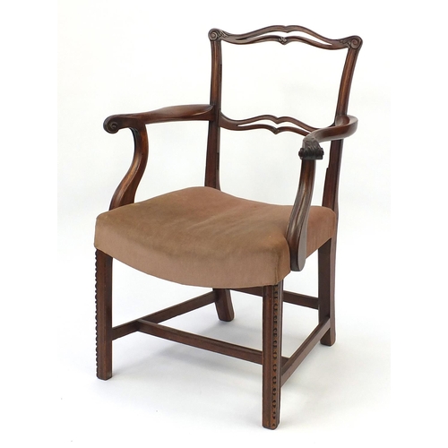 27 - Antique mahogany open armchair, with scroll arms