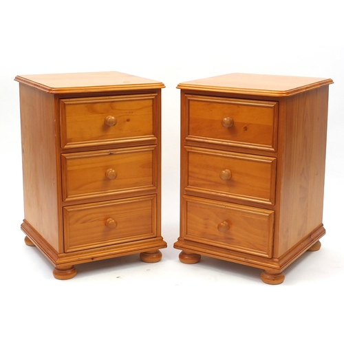 13 - Pair of pine three drawer bedside chests, 68cm H x 43cm W x 46cm D