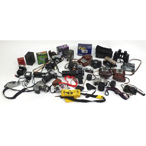 194 - Vintage and later cameras, lenses and accessories including Yashica, Olympus and Kodak examples