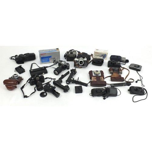 174 - Vintage and later cameras, lenses and accessories including Ilford, Olympus and Canon examples