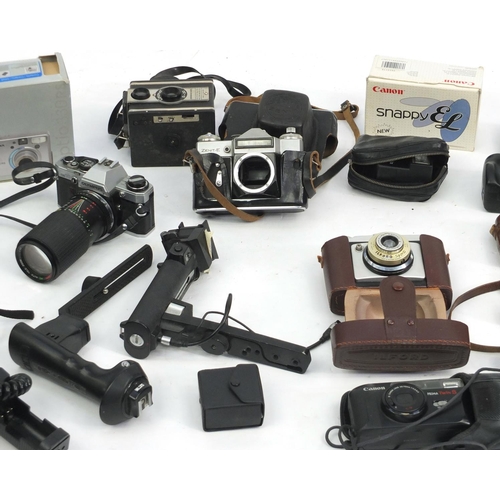 174 - Vintage and later cameras, lenses and accessories including Ilford, Olympus and Canon examples