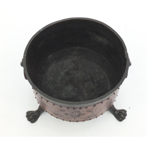 183 - Copper coal bucket with paw feet and lion mask handles, 29cm high x 34cm in diameter