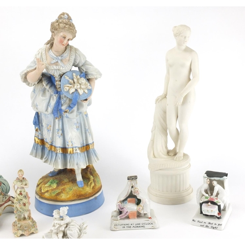 245 - Victorian and later china figures including Bedtime Fairings and a nude Parian style figurine, the l... 