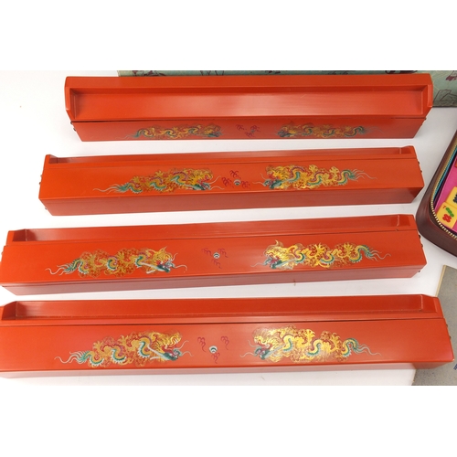 2209 - Majhong set with four lacquered stands, each hand painted with two dragons chasing the flaming pearl