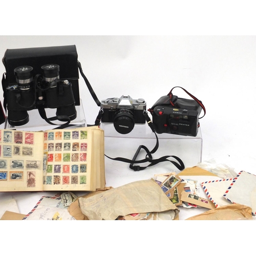 188 - Group of stamps, cameras and pair of Tasco binoculars