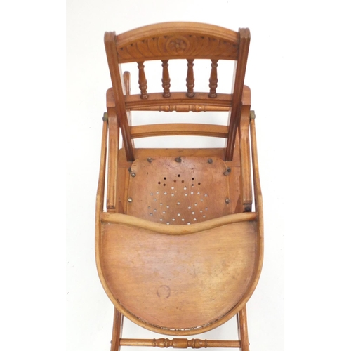 56 - Childs Metamorphic rocking chair/highchair