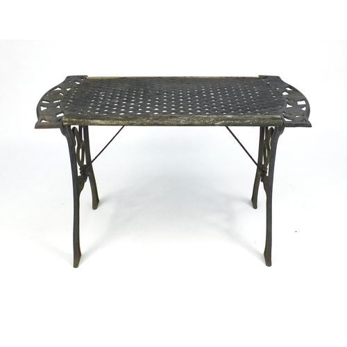 125 - Wrought iron garden table, bench and two chairs