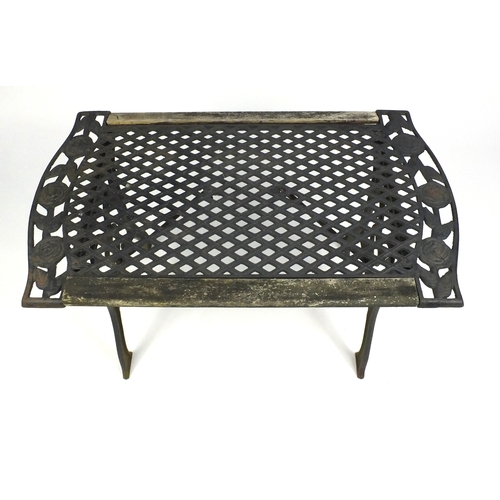 125 - Wrought iron garden table, bench and two chairs