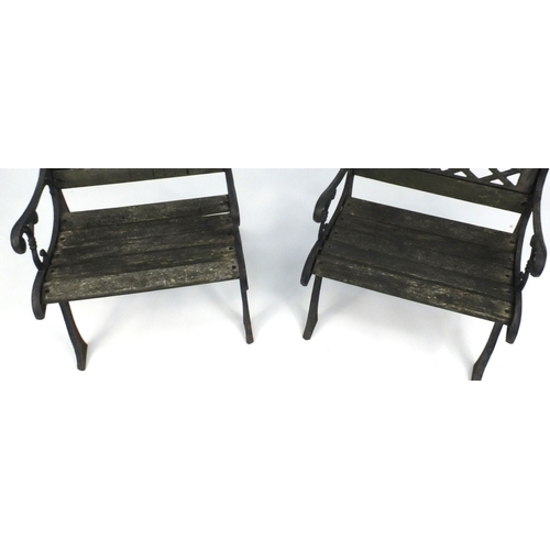 125 - Wrought iron garden table, bench and two chairs