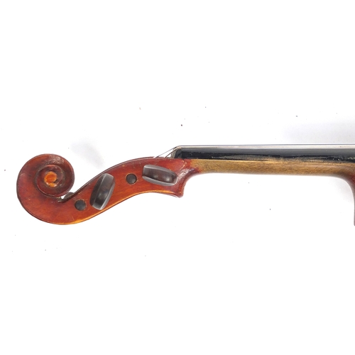 234 - Old wooden violin with scrolled neck, bow and fitted carrying case, the violin back 13.5