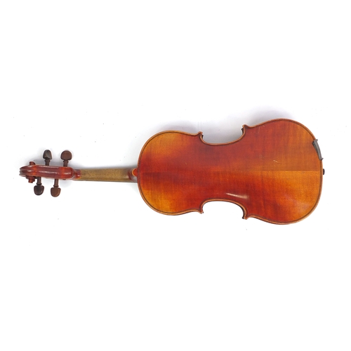 234 - Old wooden violin with scrolled neck, bow and fitted carrying case, the violin back 13.5