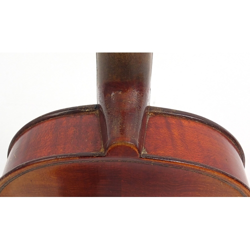 234 - Old wooden violin with scrolled neck, bow and fitted carrying case, the violin back 13.5