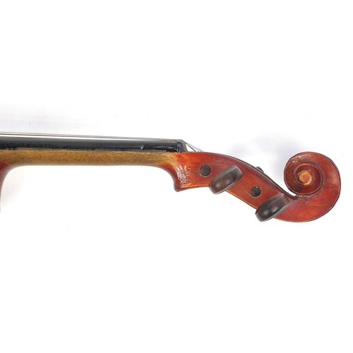 234 - Old wooden violin with scrolled neck, bow and fitted carrying case, the violin back 13.5