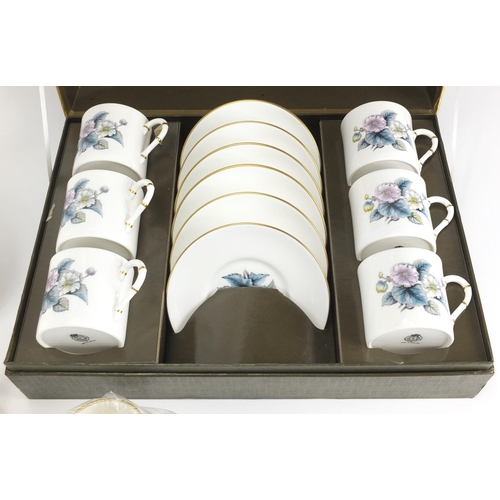 244 - Royal Worcester teaware including set of six coffee cans and saucers and Astley cake stand, both box... 