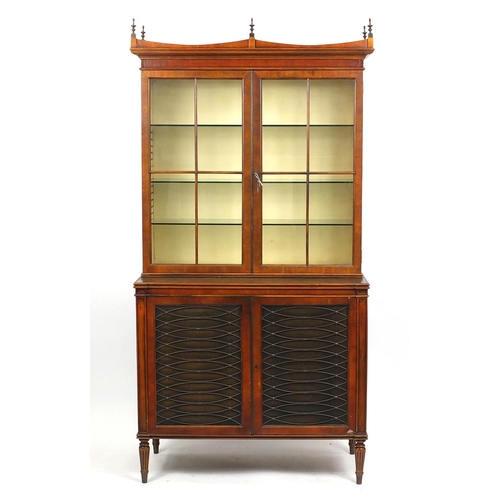 30 - Mahogany bookcase, fitted with a pair of glazed doors enclosing three adjustable glass shelves, abov... 