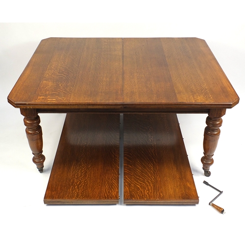 8 - Victorian oak wind out dining table with two extra leaves and winder, 74cm H x 150cm W x 122cm D