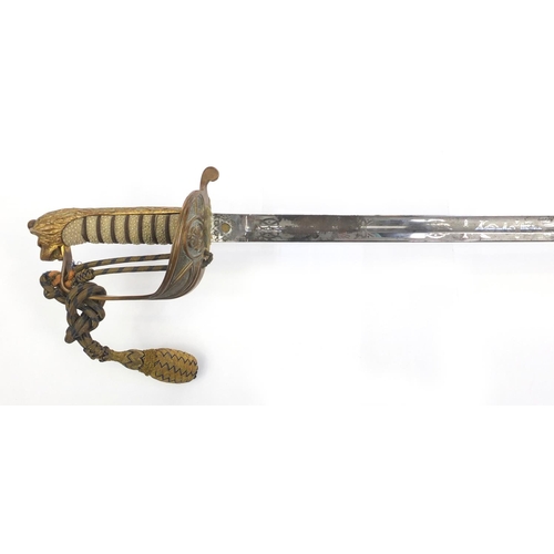 574 - George V Naval dress sword, retailed by Gieves with scabbard and wire bound shagreen grip, steel bla... 