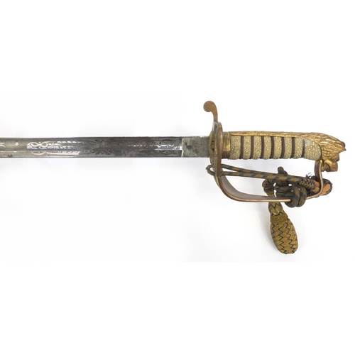 574 - George V Naval dress sword, retailed by Gieves with scabbard and wire bound shagreen grip, steel bla... 