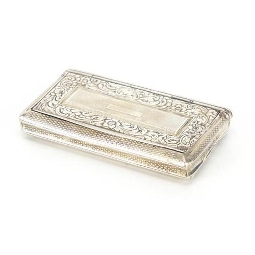 40 - Rectangular continental silver snuff box with engine turned decoration, the hinged lid engraved with... 