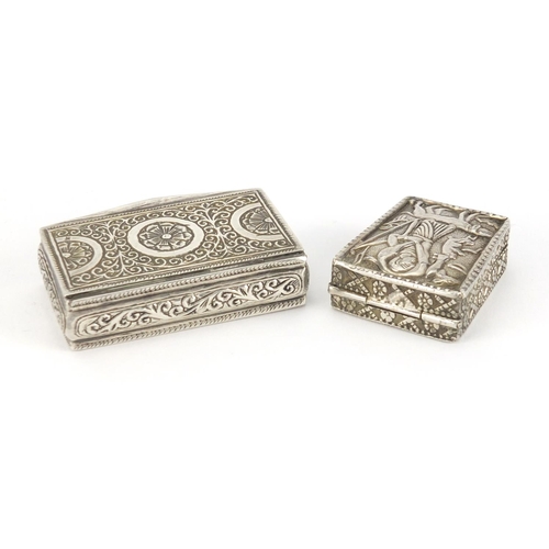 48 - Three rectangular unmarked silver boxes with hinged lids, one embossed with Romulus and Remus suckli... 