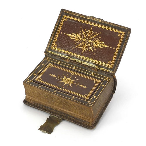 33 - 19th century novelty secret snuff box in the form of a leather bound Crumbs of Comfort book with bra... 