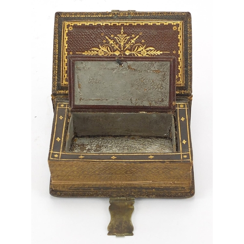 33 - 19th century novelty secret snuff box in the form of a leather bound Crumbs of Comfort book with bra... 
