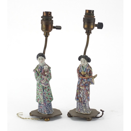 638 - Pair of Chinese porcelain figural lamp bases with bronze mounts, each hand painted in the famille ro... 