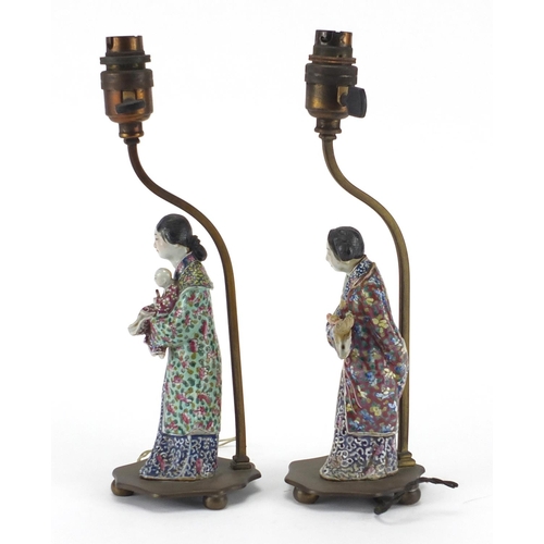 638 - Pair of Chinese porcelain figural lamp bases with bronze mounts, each hand painted in the famille ro... 