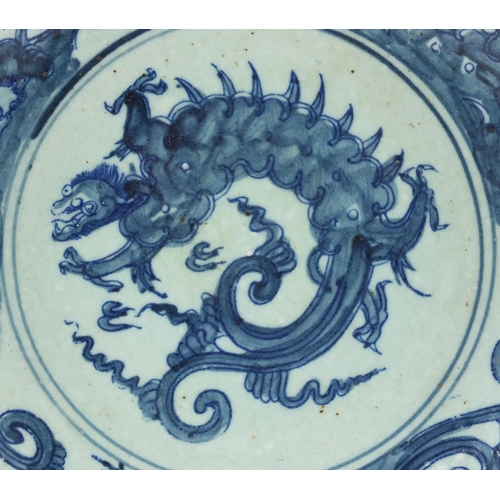 603 - Chinese porcelain shallow dish hand painted with four dragons, 28cm in diameter