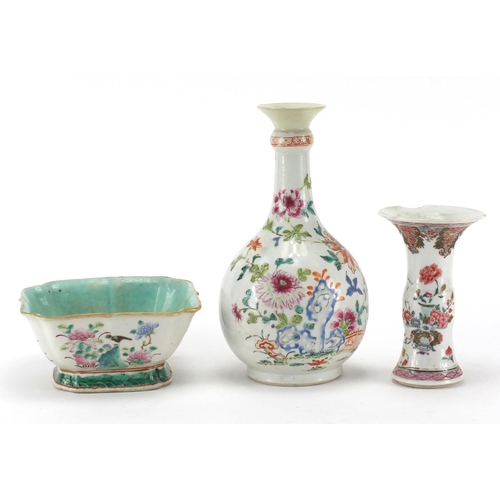 635 - Chinese porcelain comprising a square footed bowl and two famille rose vases, all hand painted with ... 