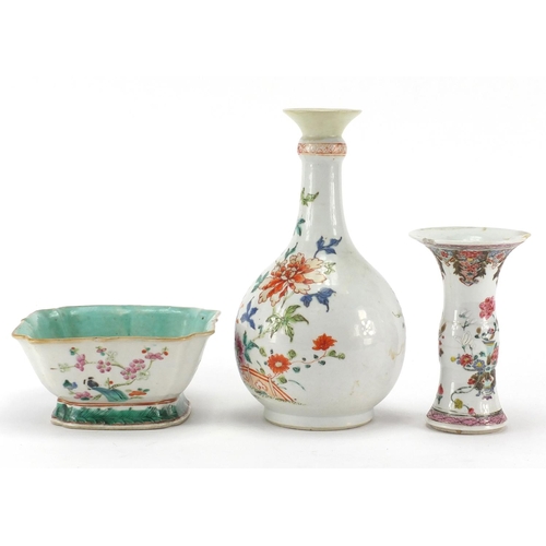 635 - Chinese porcelain comprising a square footed bowl and two famille rose vases, all hand painted with ... 