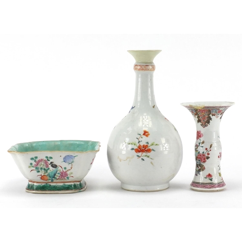 635 - Chinese porcelain comprising a square footed bowl and two famille rose vases, all hand painted with ... 