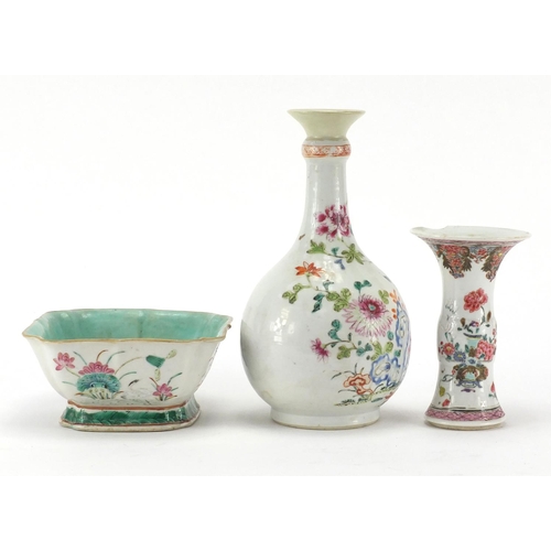 635 - Chinese porcelain comprising a square footed bowl and two famille rose vases, all hand painted with ... 