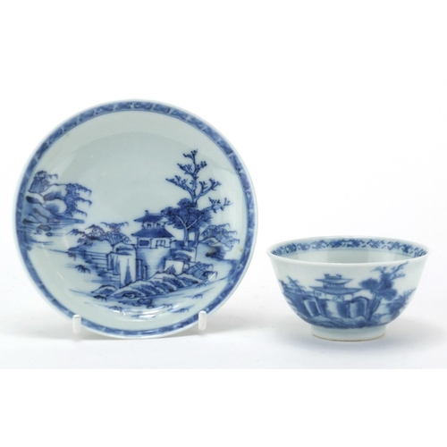 596 - Chinese Nanking Cargo blue and white porcelain tea bowl and saucer, each hand painted with a river l... 