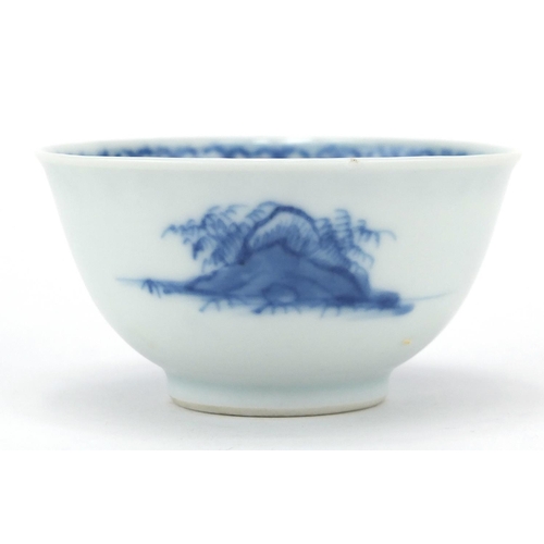 596 - Chinese Nanking Cargo blue and white porcelain tea bowl and saucer, each hand painted with a river l... 