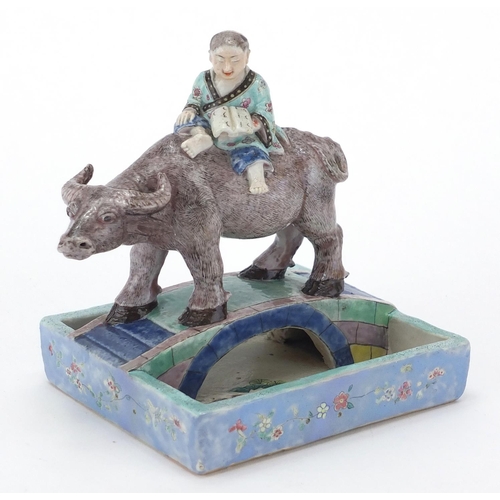 611 - Chinese porcelain boy and a buffalo crossing a bridge brush washer, finely hand painted in the famil... 