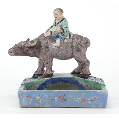 611 - Chinese porcelain boy and a buffalo crossing a bridge brush washer, finely hand painted in the famil... 