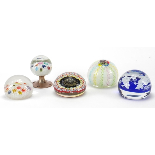 913 - Five colourful glass paperweights, including one with a classical scene, Italian example with two fi... 