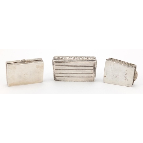 48 - Three rectangular unmarked silver boxes with hinged lids, one embossed with Romulus and Remus suckli... 