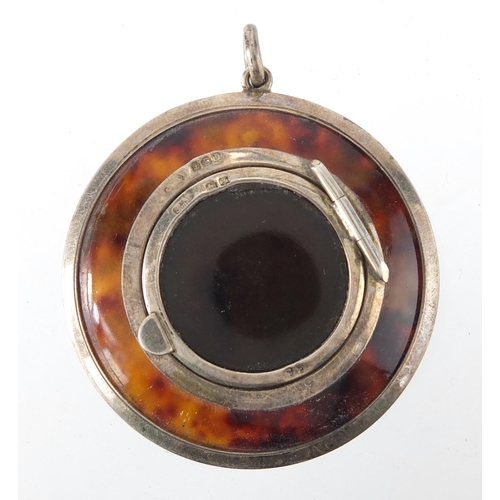 60 - Circular silver mounted tortoiseshell compact, with mirrored hinged lid, Birmingham 1922, 4.5cm in d... 