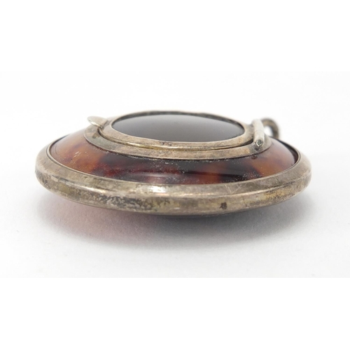 60 - Circular silver mounted tortoiseshell compact, with mirrored hinged lid, Birmingham 1922, 4.5cm in d... 