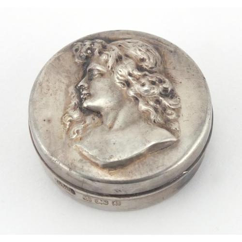 58 - Art Nouveau silver pill box, the lid embossed with a maidens head, A.W.P Birmingham 1902, 3.8cm in d... 