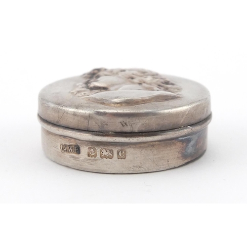 58 - Art Nouveau silver pill box, the lid embossed with a maidens head, A.W.P Birmingham 1902, 3.8cm in d... 