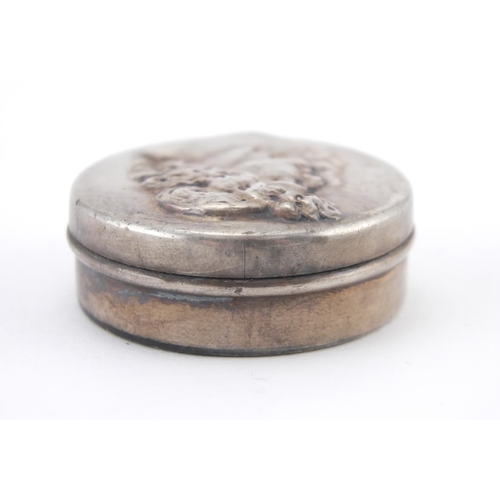 58 - Art Nouveau silver pill box, the lid embossed with a maidens head, A.W.P Birmingham 1902, 3.8cm in d... 