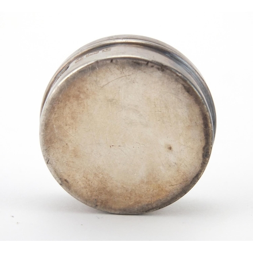 58 - Art Nouveau silver pill box, the lid embossed with a maidens head, A.W.P Birmingham 1902, 3.8cm in d... 